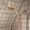image:imageMoen 82775BL Beric SingleHandle Tub and Shower Faucet with Handshower and Metal Hose Valve Included IPS Tub Spout Matte BlackBronzed Gold